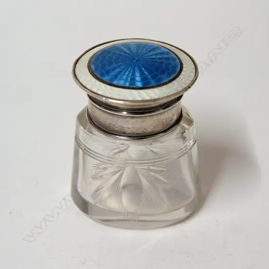 An early 20thC Art Deco enamelled silver and cut glass salt bottle