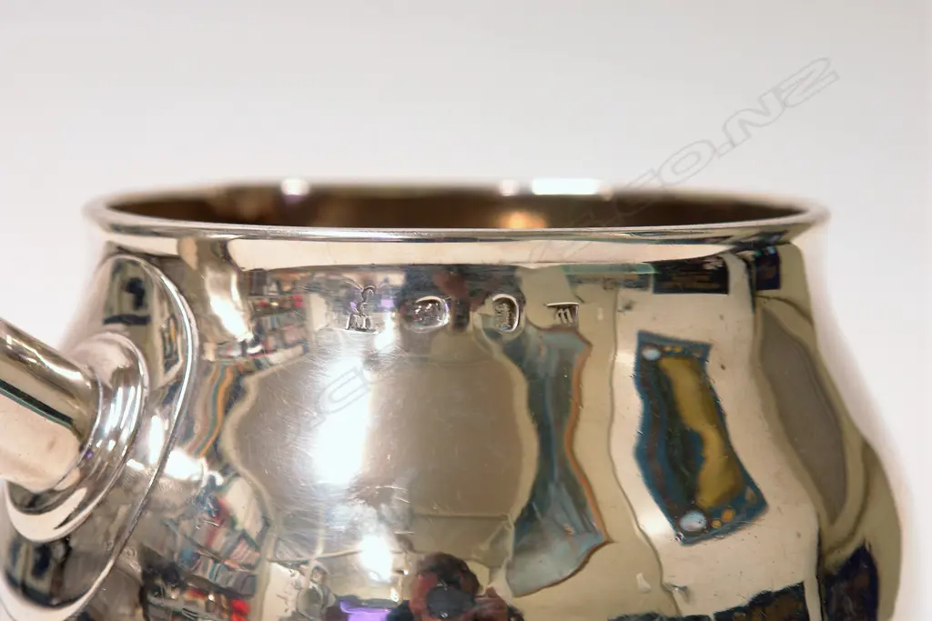 A rare and large Queen Anne silver brandy saucepan Image 1++