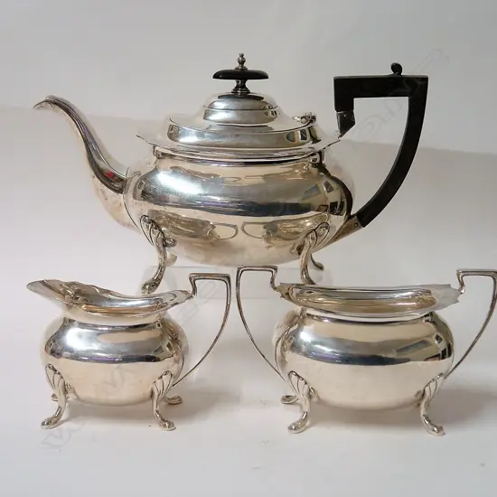 An early 20thC heavy silver three-piece tea service