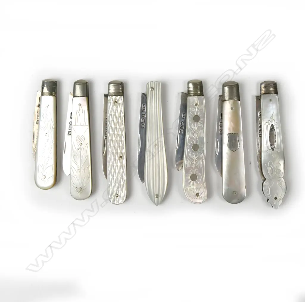 Seven silver and mother of pearl fruit knives Image 1++