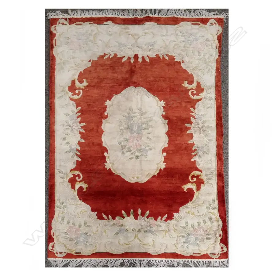 A hand knotted sculpted silk rug Image 1++
