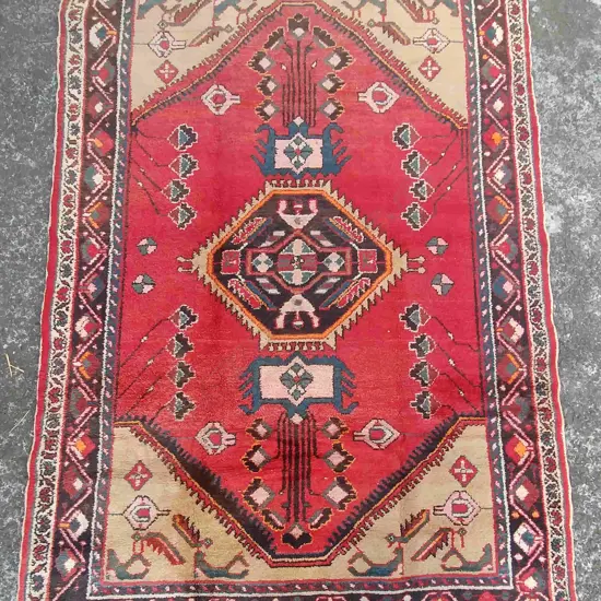 A hand knotted Persian Bakhtiari rug