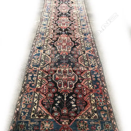 An old hand knotted Persian Hamadan runner