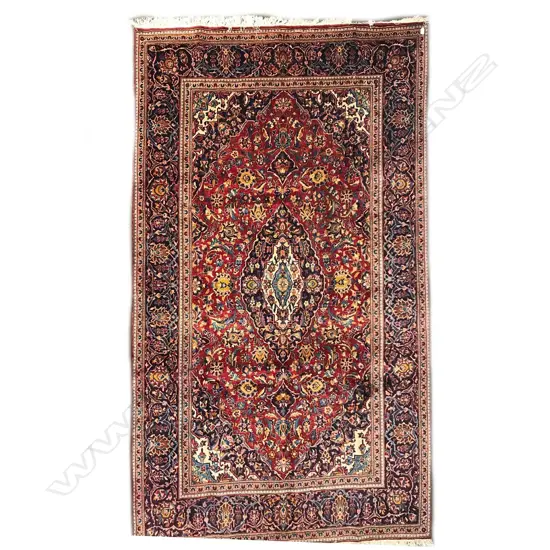 A hand knotted Kashan carpet