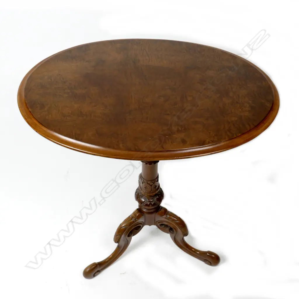A Victorian walnut oval wine table Image 1++