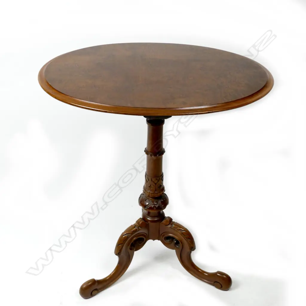 A Victorian walnut oval wine table Image 1++