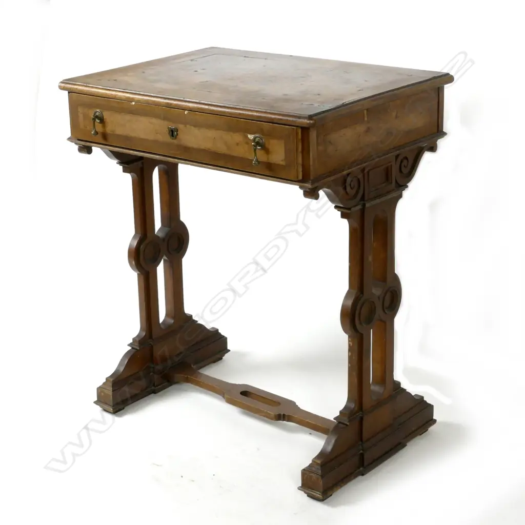 A Victorian burr walnut side table with single drawer Image 1++