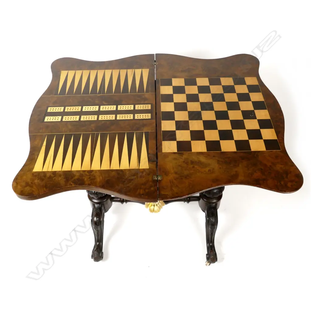 A quality Victorian burr walnut fold-over top games table Image 1++