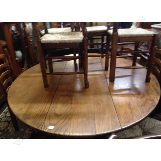 An oak Sefton Powrie Irish gate-leg 'wake' table