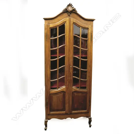 An elegant small astragal glazed display cabinet