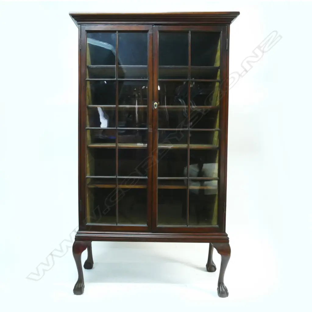A Victorian tall bookcase cabinet with two glazed panelled doors Image 1++