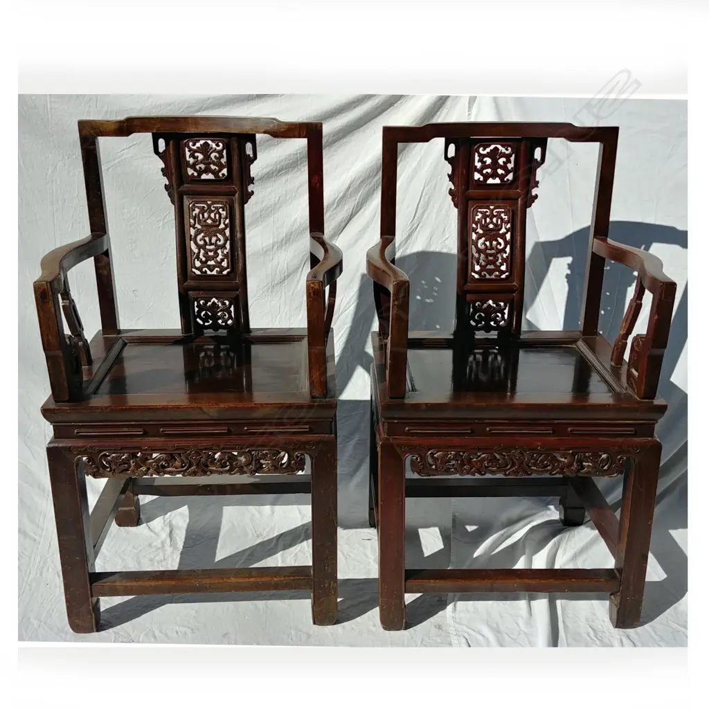 Four old Chinese dark hardwood open elbow chairs Image 1++