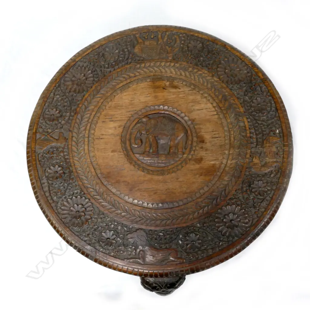 A carved Indian occasional table Image 1++