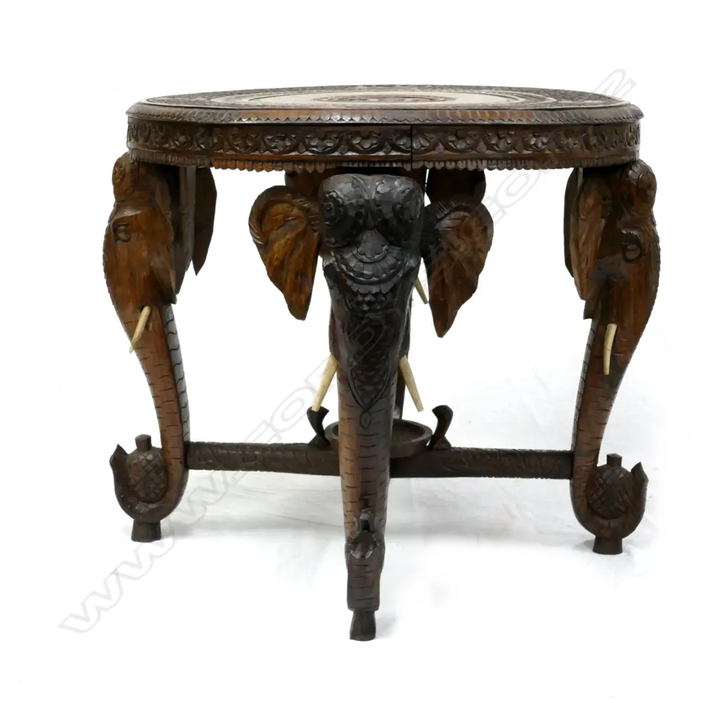 A carved Indian occasional table Image 1++