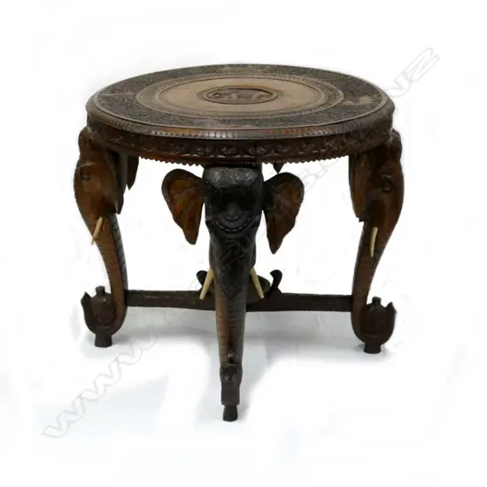A carved Indian occasional table