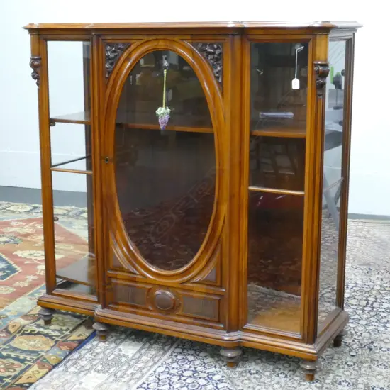 A good quality French walnut display cabinet