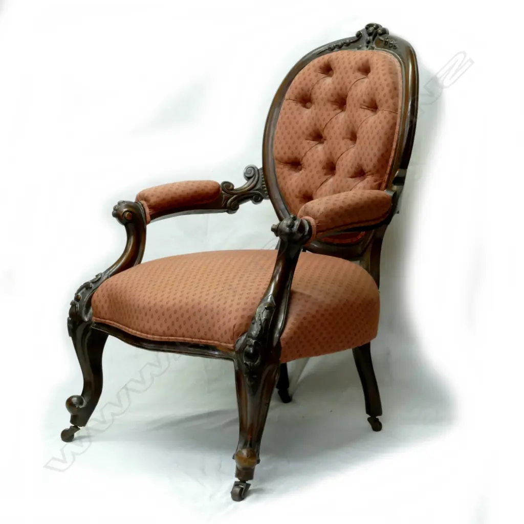 A Victorian mahogany open elbow armchair Image 1++