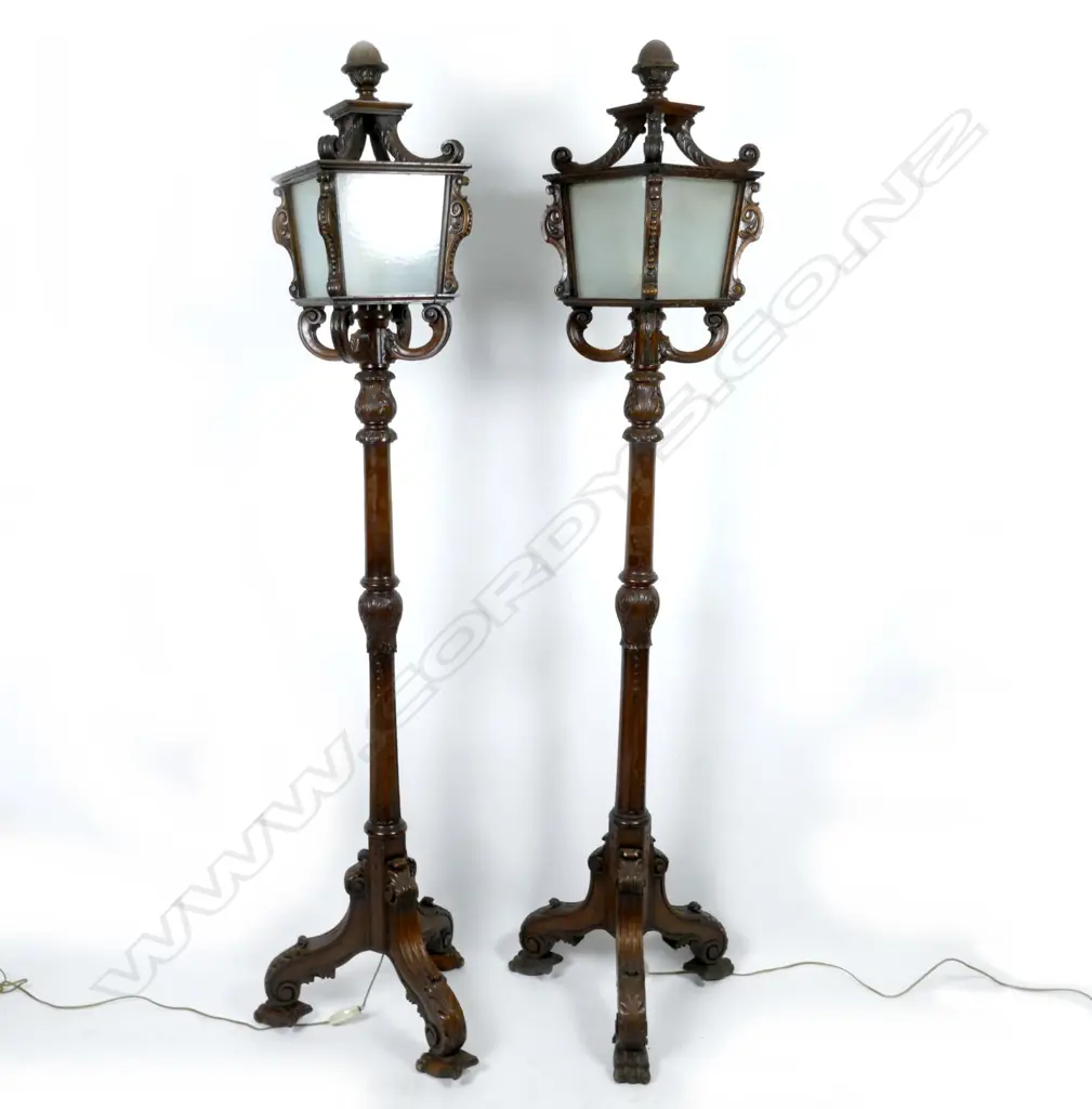 An ornate and unusual pair of vintage mahogany standing lanterns Image 1++