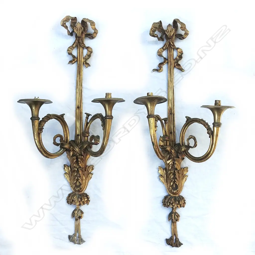 A pair of cast brass trumpet twin light wall brackets of French Louis XV style Image 1++