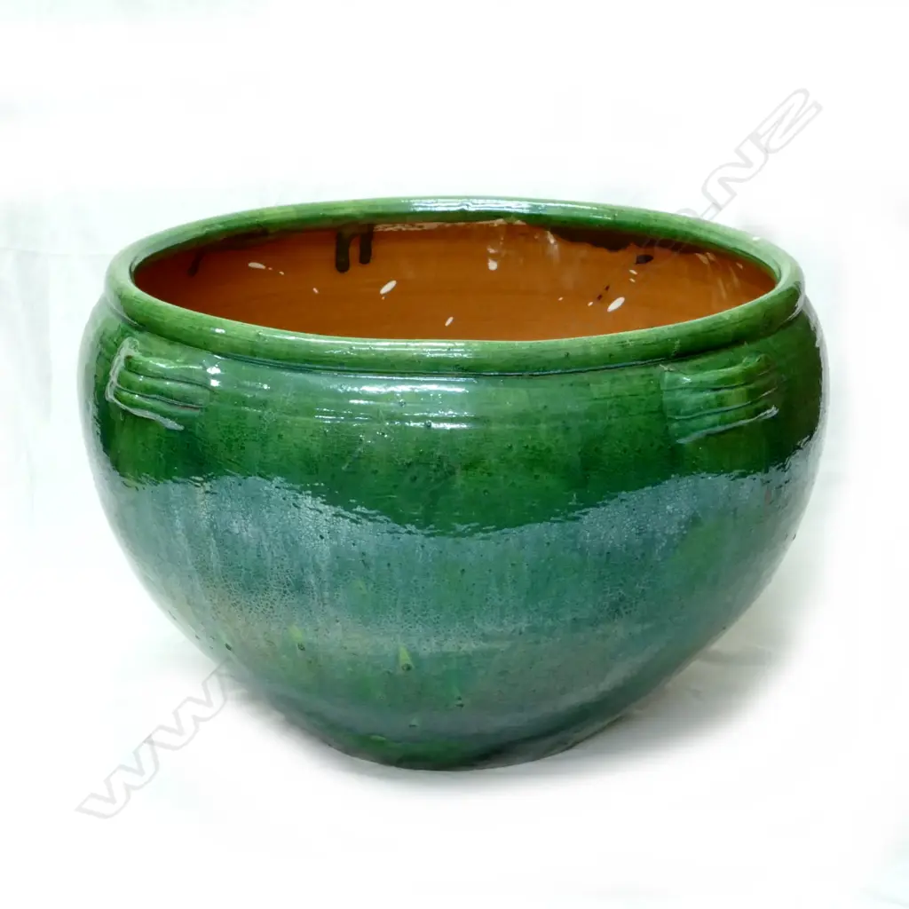 A terracotta green glazed garden pot Image 1++