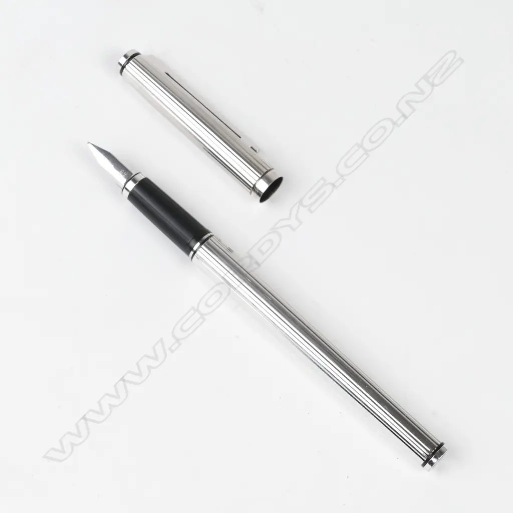 A Pelikan silver plate fountain pen Image 1++