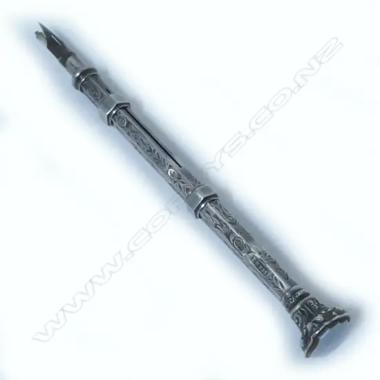 Silver combination sliding dip pen and pencil