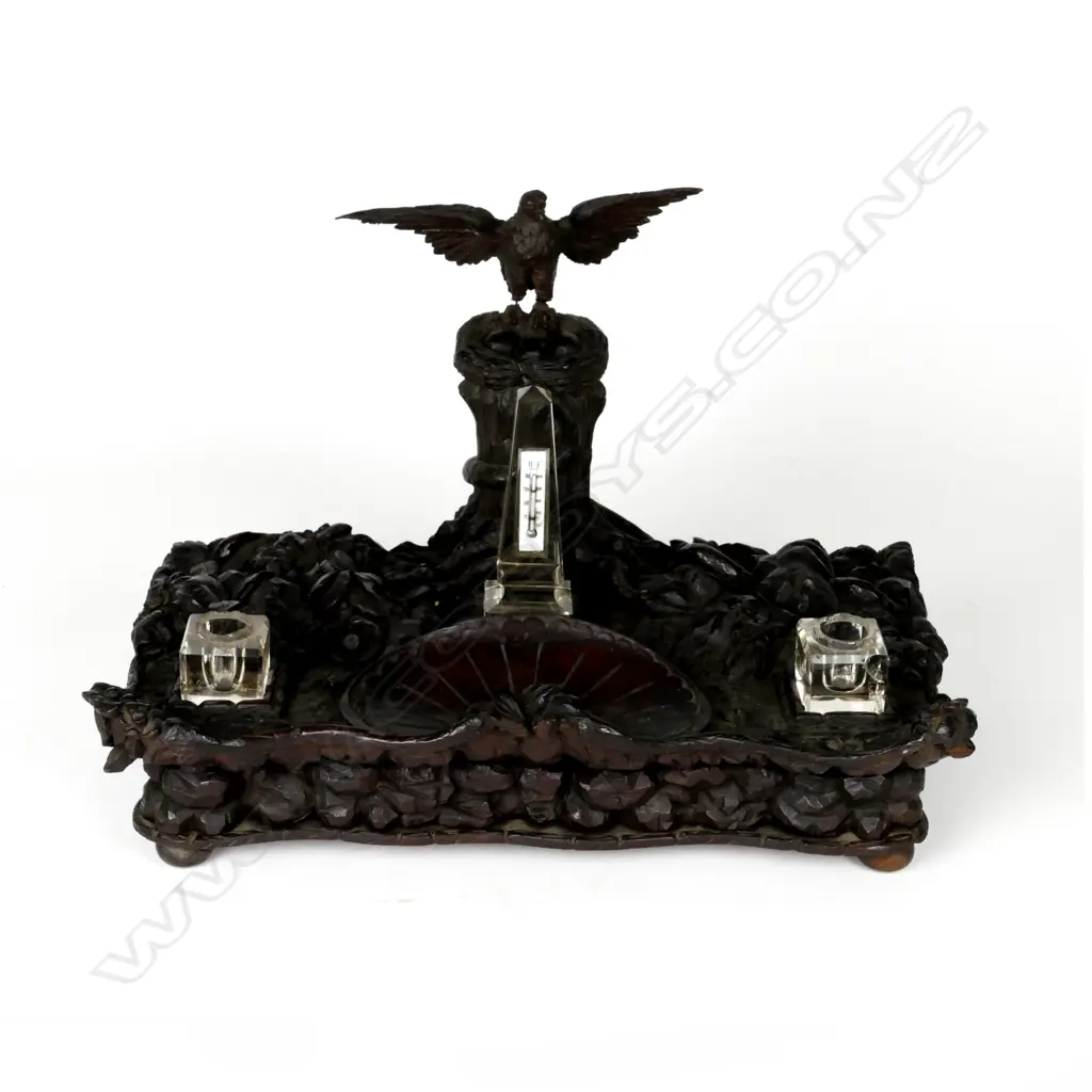 An early 19thC European desk stand of carved mahogany Image 1++