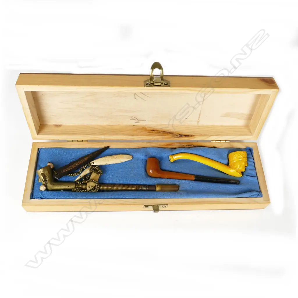 A boxed collection of miniature pipes Image 1++
