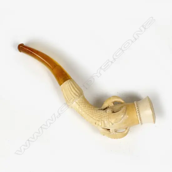 A cased meerschaum pipe