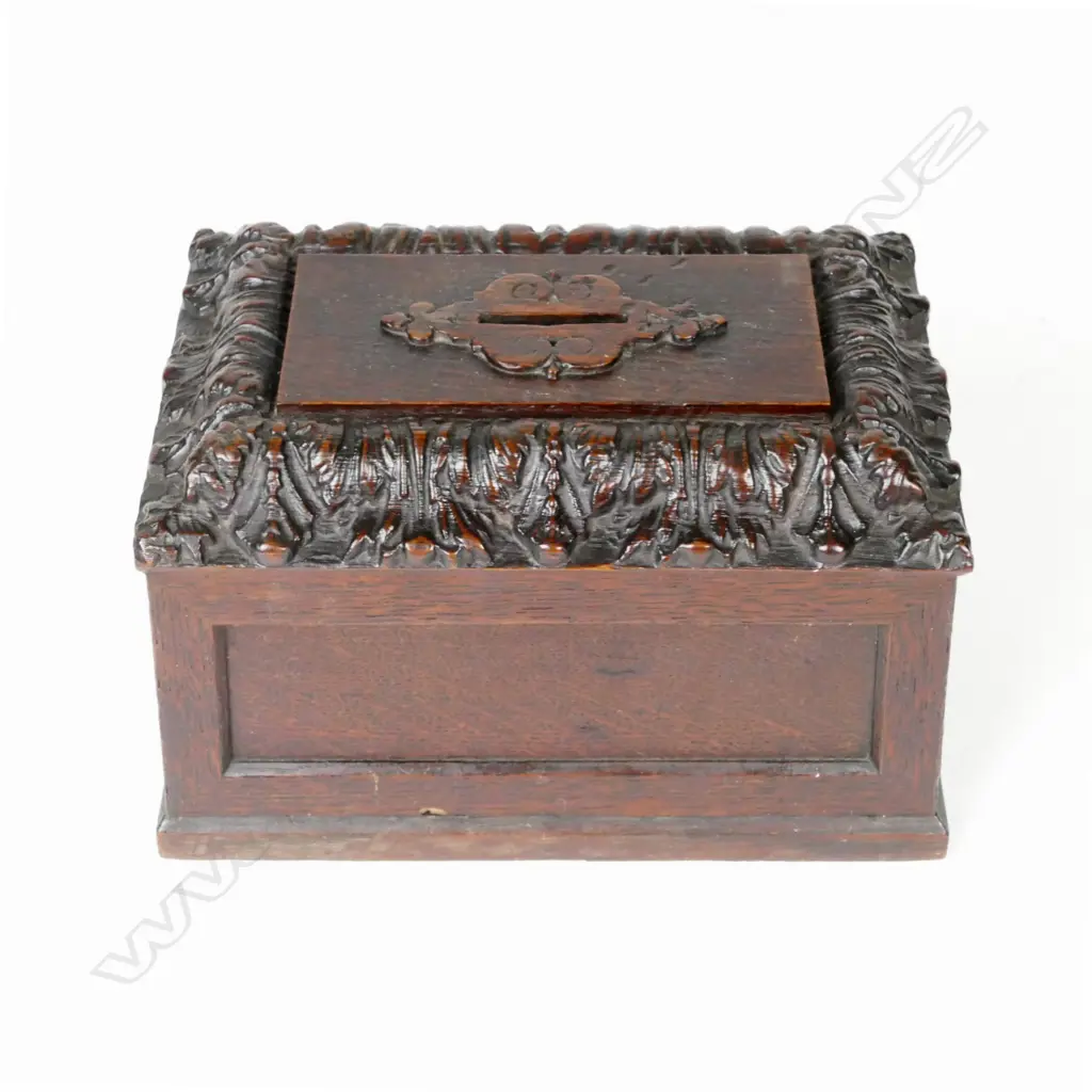 A vintage carved oak donation box Image 1++