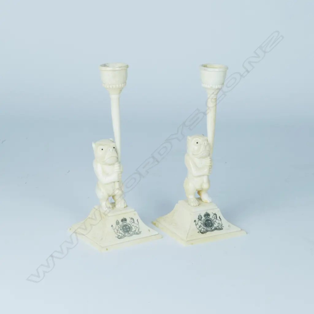 A pair of decorative bone candlesticks Image 1++