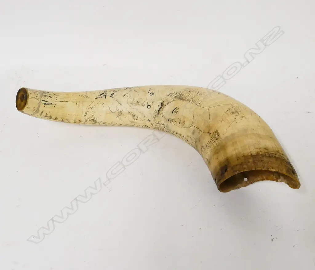 A 19thC scrimshaw powder horn Image 1++