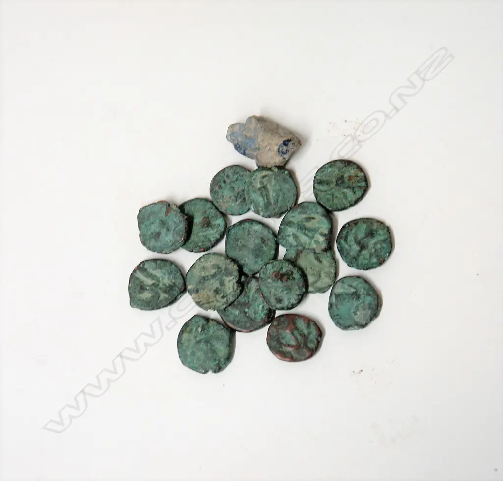 Sixteen ancient Roman bronze coins Image 1++