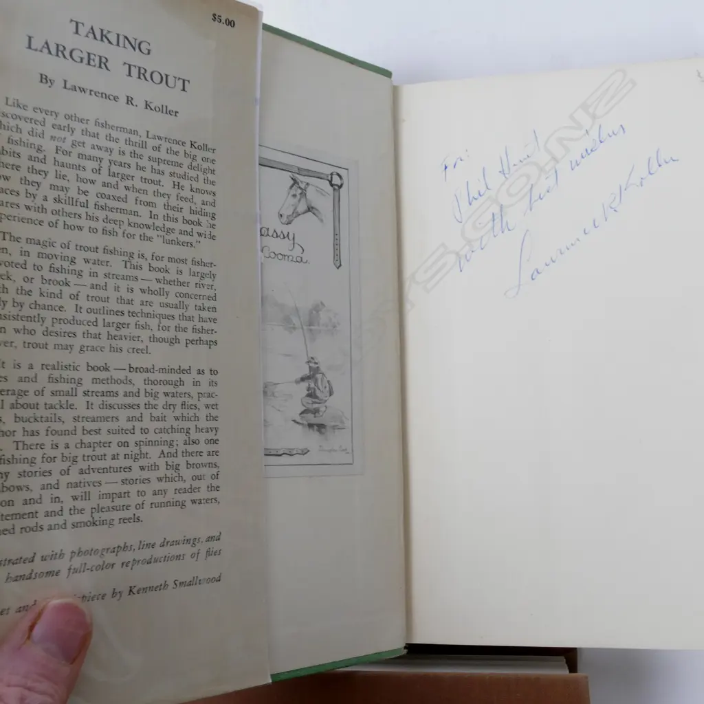 A selection of signed and first edition trout fishing books Image 1++