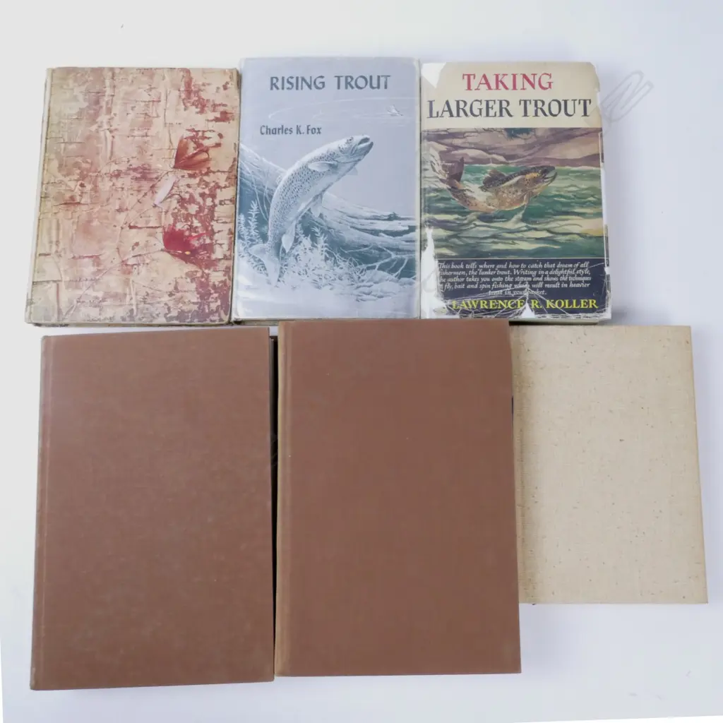 A selection of signed and first edition trout fishing books Image 1++