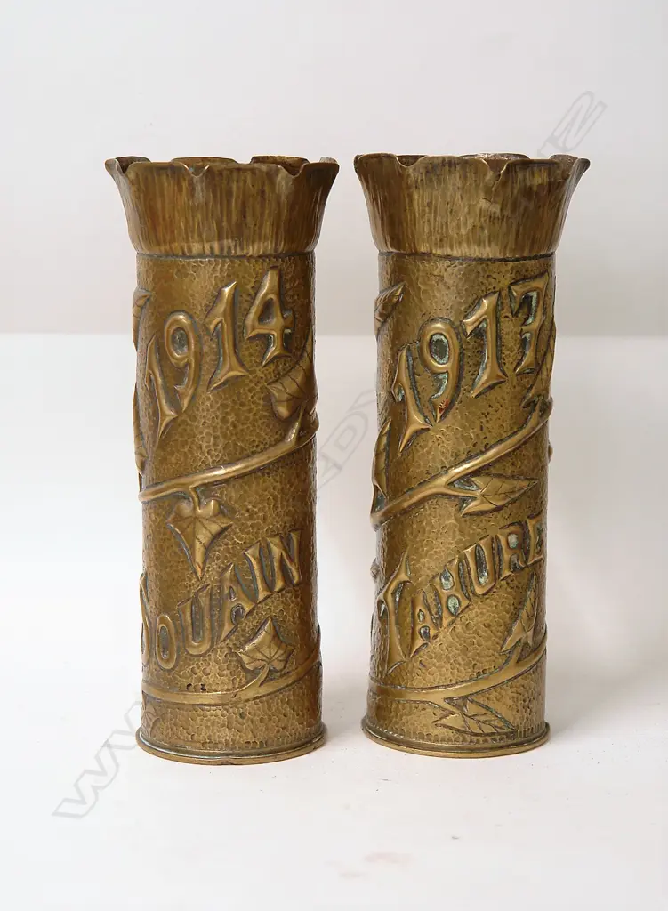A pair of WWI decorated '1914 Souain' and '1917 Tahure' brass shell cases Image 1++