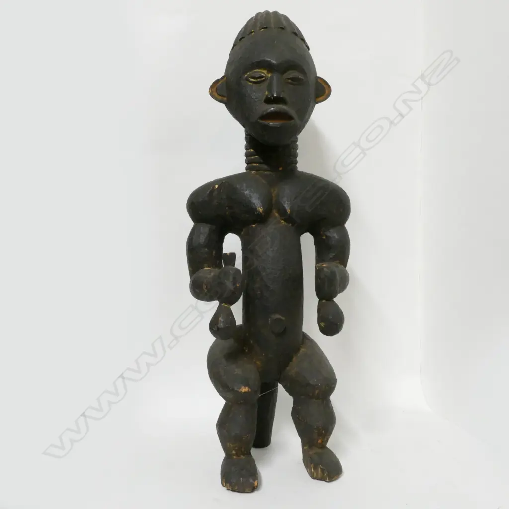 A Bangawa female figure Image 1++