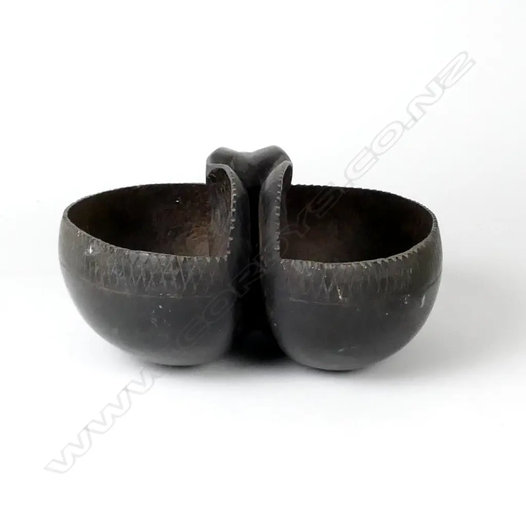 A basket made from a coco de mer Image 1++