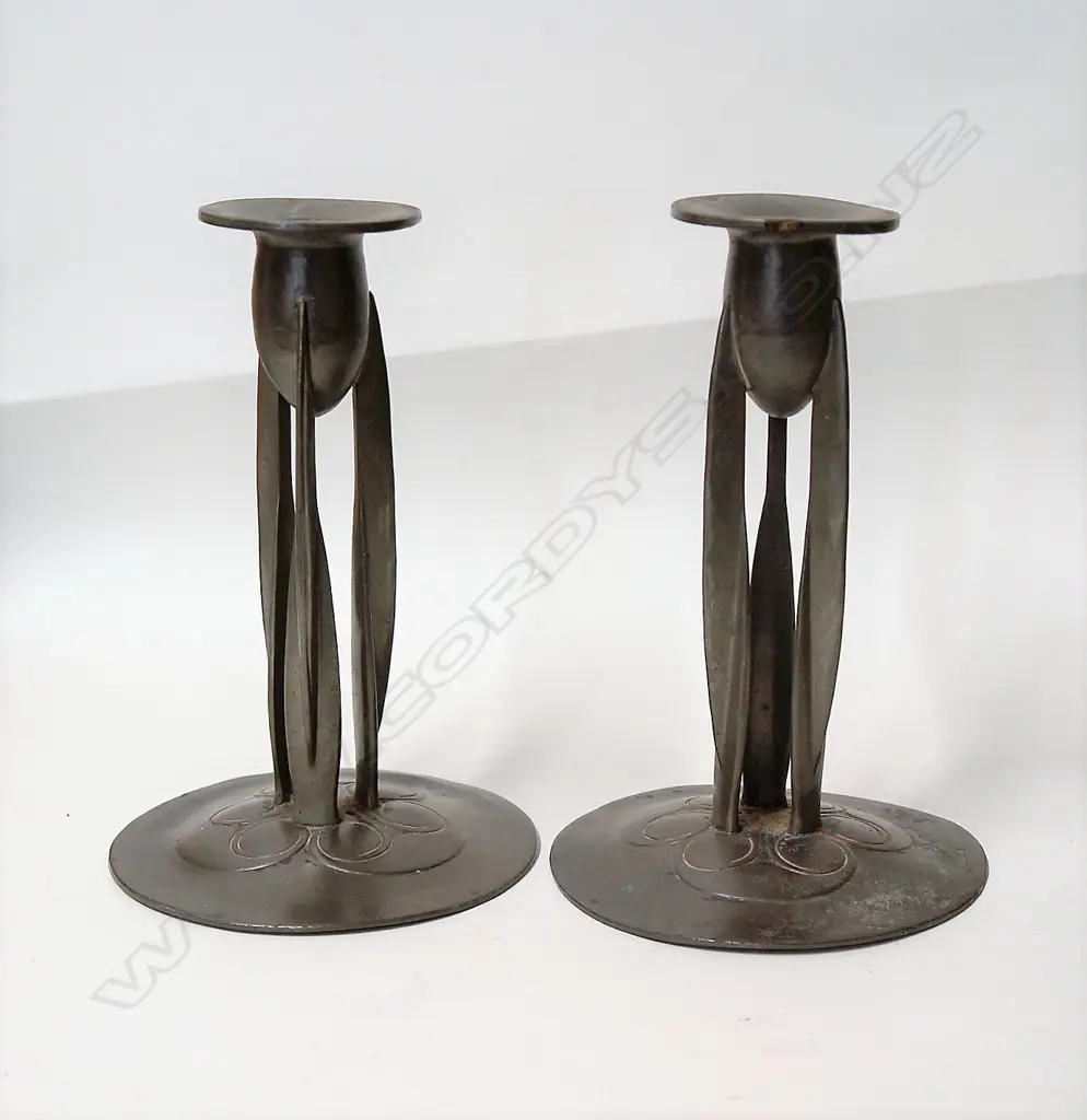 A pair of Archibald Knox English (Tudric) pewter candlesticks c.1902-1905 Image 1++