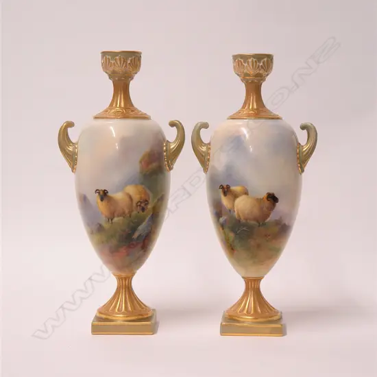 A rare pair of Edwardian Royal Worcester Black Face Sheep urn vases by E. Barker