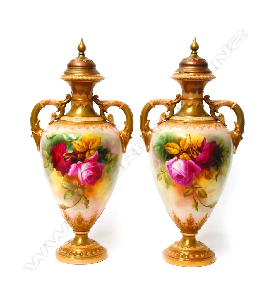 A pair of early 20thC Royal Worcester rose painted lidded urns by W. Hart Image 1++