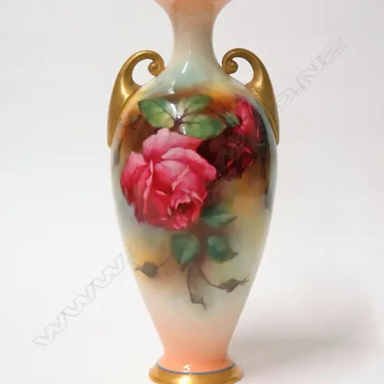 An Edwardian Royal Worcester rose painted elegant baluster vase