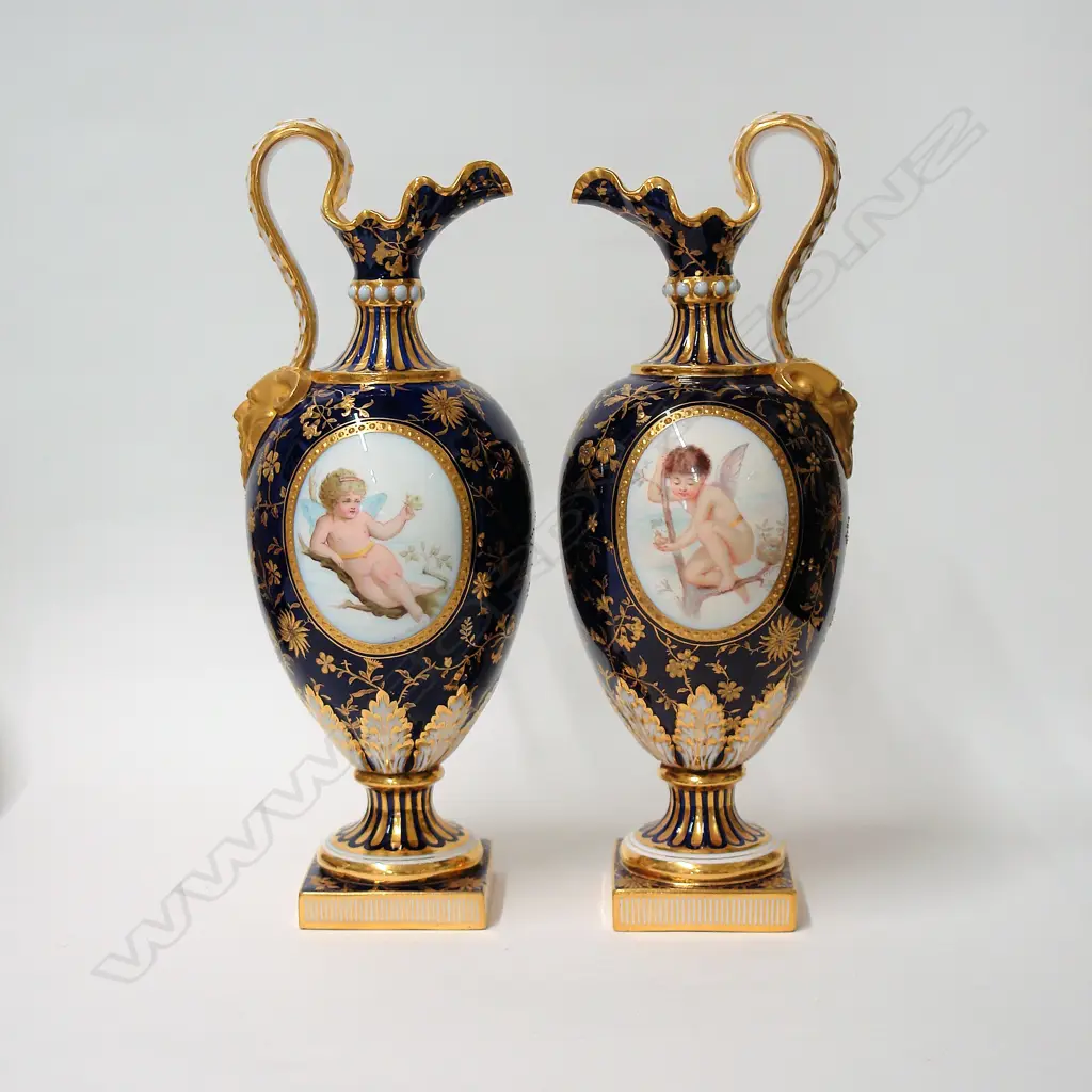 A pair of Mintons bone china ewers hand painted by Boullemier and Sutton Image 1++