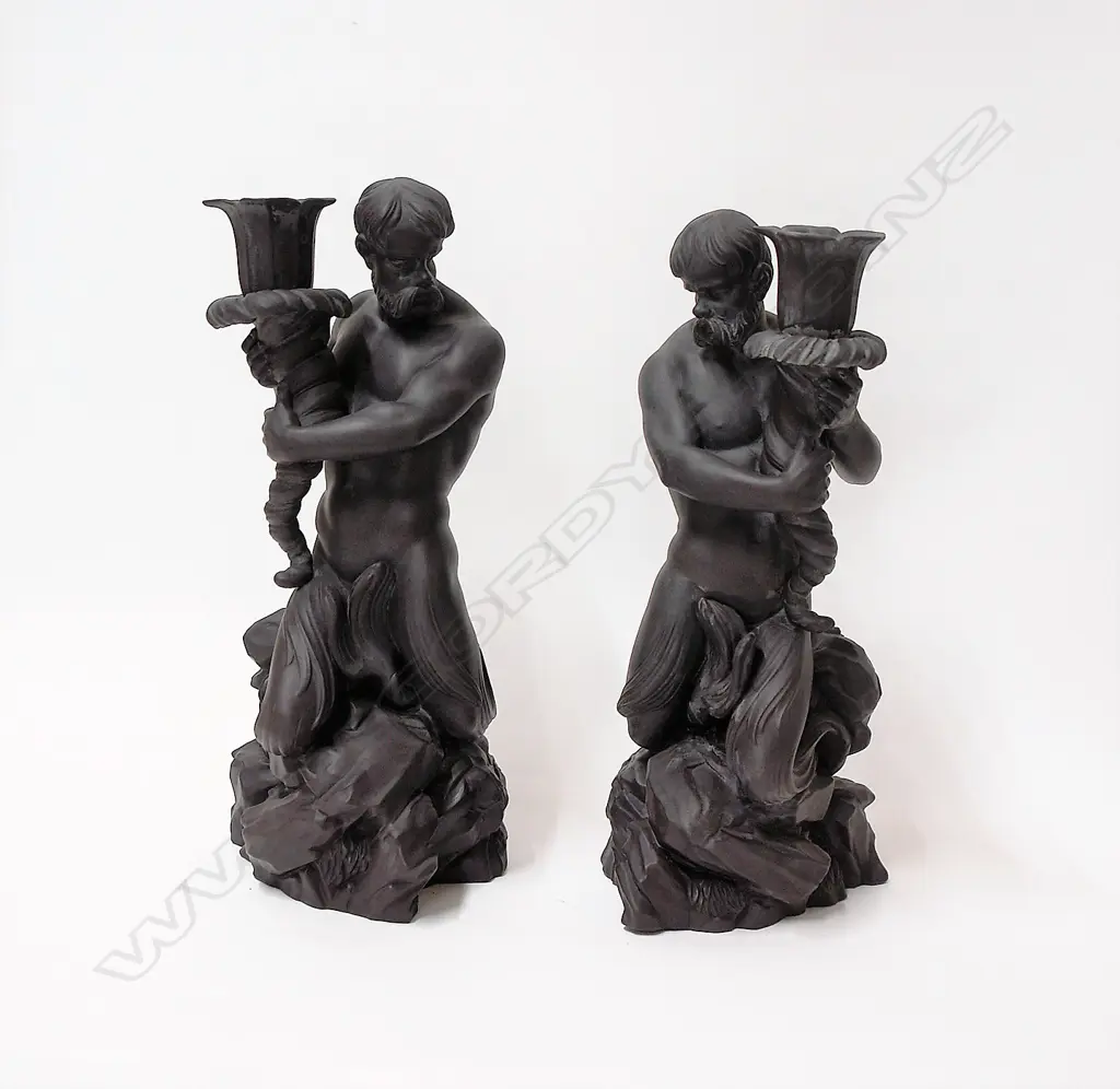 A pair of 20thC finely modelled Wedgwood black basalt mermen/Neptune candlesticks Image 1++