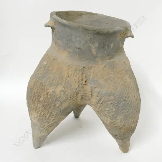 A Chinese large Neolithic three legged pottery cooking pot