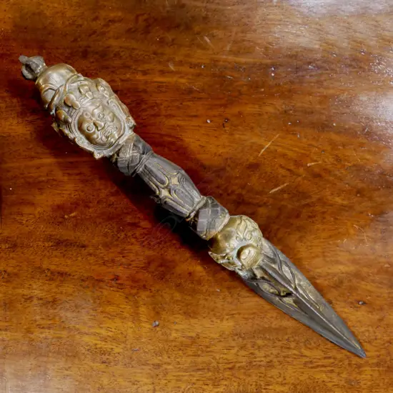 An old Tibetan bronze and iron ritual dagger