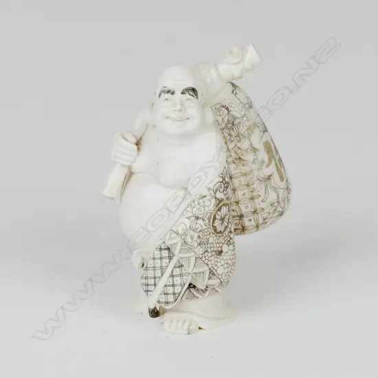 A Japanese ivory figure of Hotei