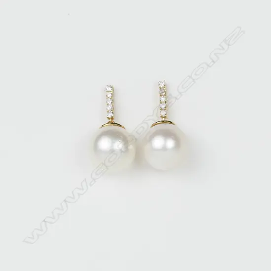 A 14ct. yellow gold diamond and pearl drop earrings