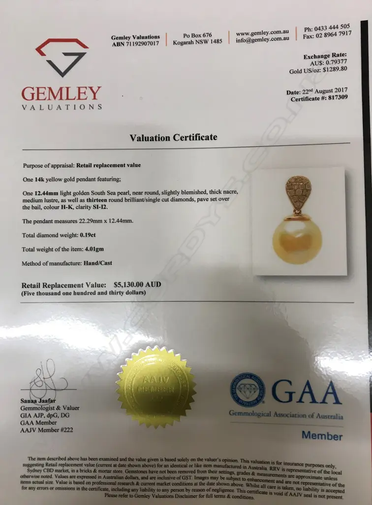 A 14ct. yellow gold diamond and pearl pendant Image 1++