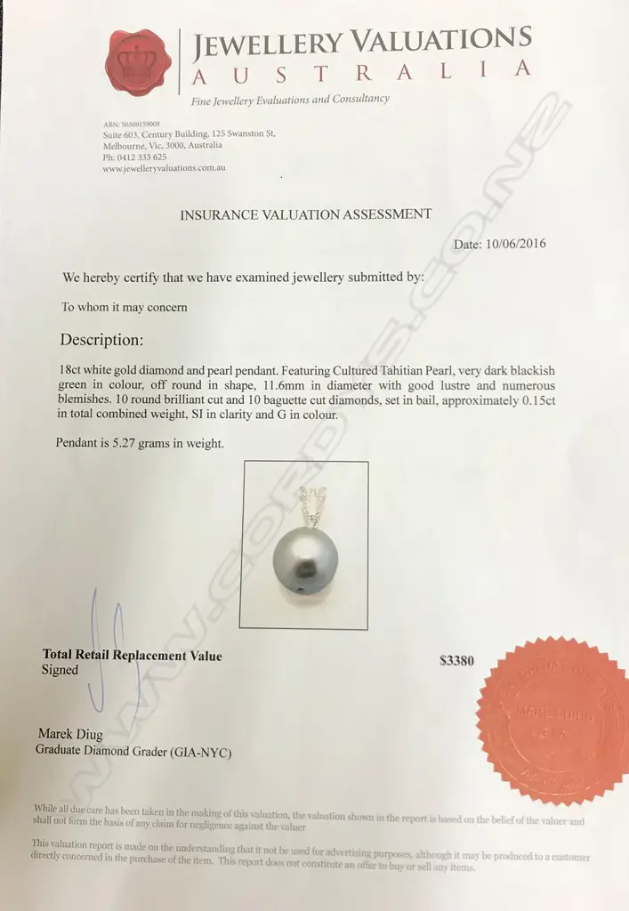 An 18ct. white gold diamond and pearl pendant Image 1++
